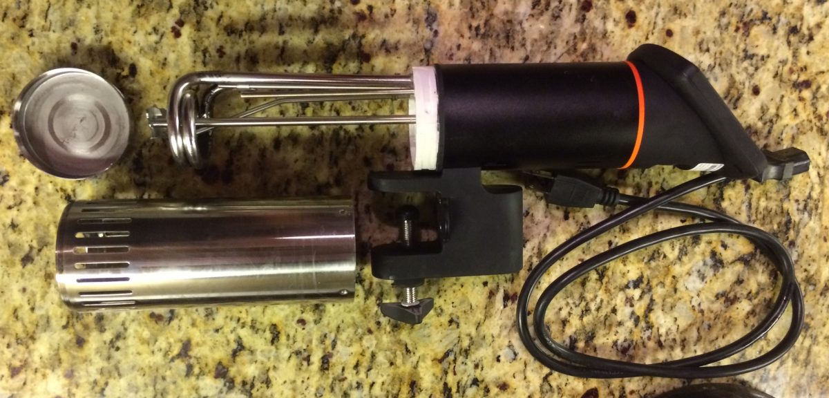 Taken apart, you can see the water level sensors, the heating element, and the pump impeller